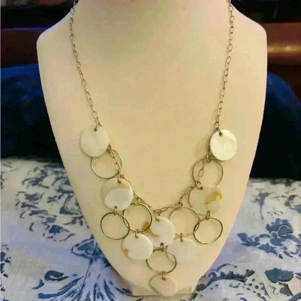 Shell and gold tone necklace